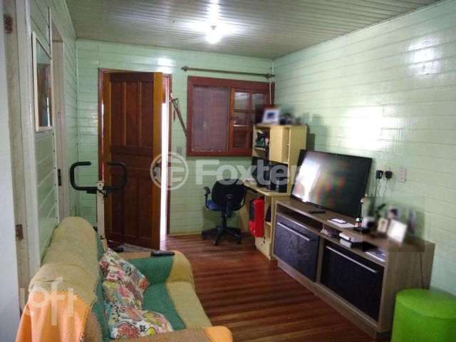 Casa com 3 quartos à venda na Rua Mara Martins de Martins, 171, Vila Nova, Porto Alegre, 199 m2 por R$ 220.000