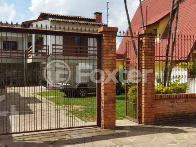 Casa com 7 quartos à venda na Rua General Telino Chagastelles, 75, Parque Santa Fé, Porto Alegre, 270 m2 por R$ 600.000