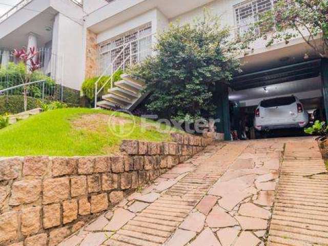 Casa com 3 quartos à venda na Rua Gustavo Schmidt, 332, Três Figueiras, Porto Alegre, 227 m2 por R$ 1.350.000