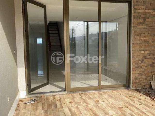 Casa com 3 quartos à venda na Rua Antônio Carlos Pereira de Souza, 36, Mário Quintana, Porto Alegre, 112 m2 por R$ 450.000