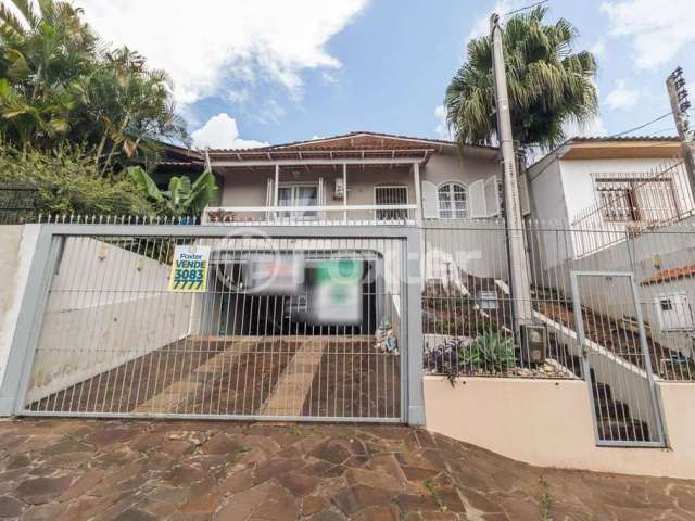 Casa com 3 quartos à venda na Rua Vital Brasil, 69, Jardim Itu Sabará, Porto Alegre, 120 m2 por R$ 650.000