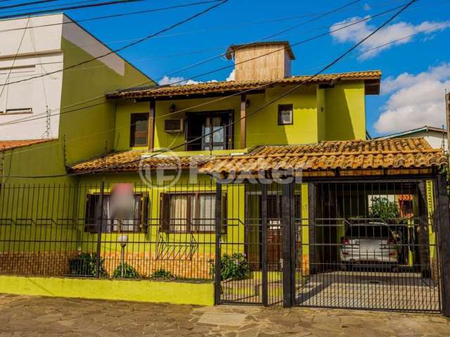 Casa com 3 quartos à venda na Avenida Doutor Rubem Knijnik, 87, Parque Santa Fé, Porto Alegre, 239 m2 por R$ 900.000