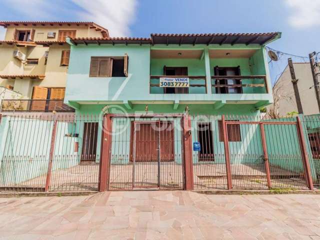 Casa com 3 quartos à venda na Rua Guadalajara, 115, Jardim Itu Sabará, Porto Alegre, 262 m2 por R$ 720.000