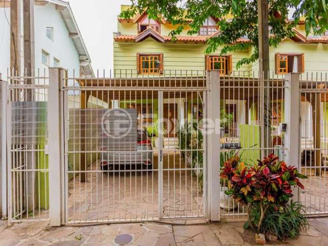 Casa com 3 quartos à venda na Rua Elias Bothome, 159, Jardim Itu Sabará, Porto Alegre, 137 m2 por R$ 700.000