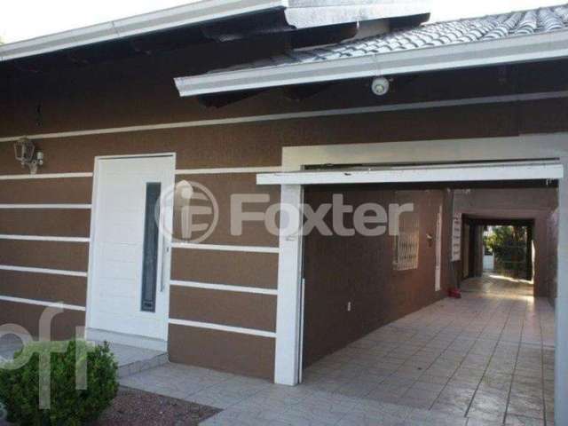 Casa com 6 quartos à venda na Rua Quinze de Novembro, 143, Nossa Senhora das Graças, Canoas, 220 m2 por R$ 690.000