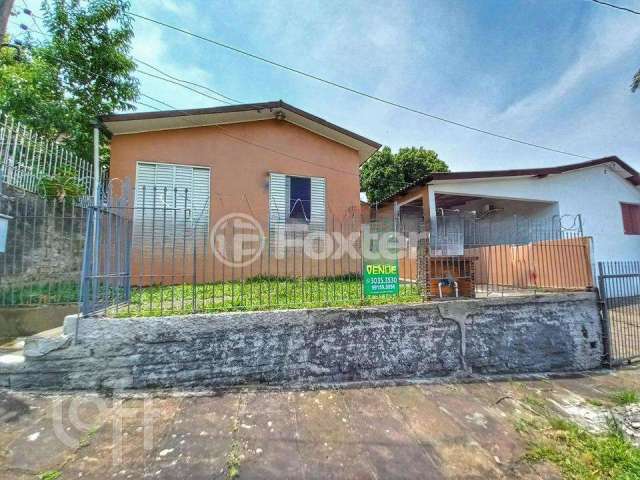 Casa com 3 quartos à venda na Rua Potiguara, 556, Canudos, Novo Hamburgo, 227 m2 por R$ 220.000