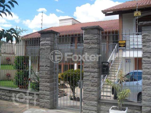 Casa com 4 quartos à venda na Avenida Farroupilha, 6251, Marechal Rondon, Canoas, 240 m2 por R$ 1.170.000