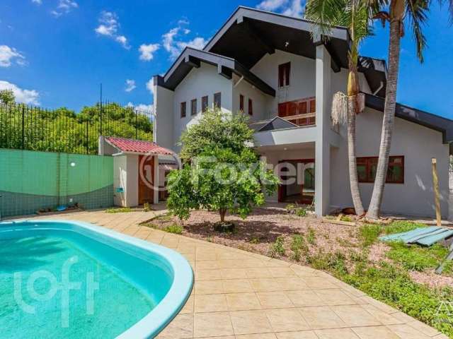 Casa com 4 quartos à venda na Avenida Doutor Sezefredo Azambuja Vieira, 308, Marechal Rondon, Canoas, 327 m2 por R$ 2.150.000