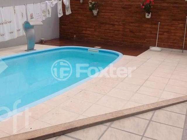 Casa com 4 quartos à venda na Rua Valmir Bernardes Ferreira, 250, Santo Afonso, Novo Hamburgo, 260 m2 por R$ 650.000