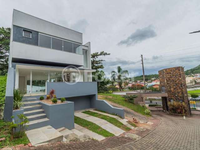 Casa em condomínio fechado com 3 quartos à venda na Avenida Juca Batista, 2705, Hípica, Porto Alegre, 167 m2 por R$ 850.000