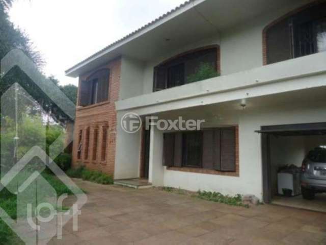 Casa com 5 quartos à venda na Rua Santa Terezinha, 286, Nossa Senhora das Graças, Canoas, 372 m2 por R$ 750.000