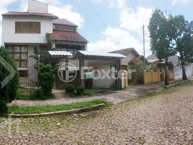 Casa com 3 quartos à venda na Rua Olécio Cavedini, 121, Espírito Santo, Porto Alegre, 300 m2 por R$ 890.000