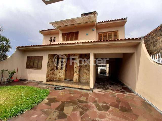 Casa com 3 quartos à venda na Rua Princesa Isabel, 735, Sumaré, Alvorada, 400 m2 por R$ 674.000