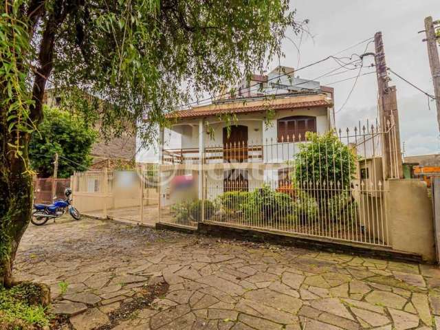 Casa com 3 quartos à venda na Rua Fontoura Xavier, 550, Jardim São Pedro, Porto Alegre, 252 m2 por R$ 901.000