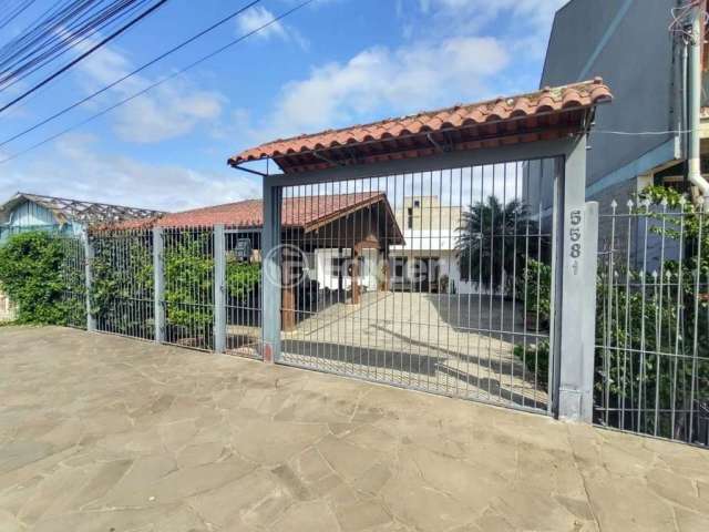 Casa com 4 quartos à venda na Avenida Senador Salgado Filho, 5581, Santo Onofre, Viamão, 217 m2 por R$ 521.500