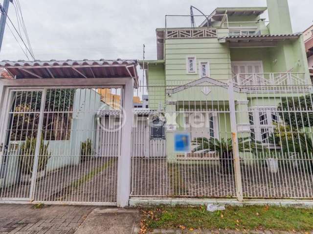 Casa com 5 quartos à venda na Rua Folha da Tarde, 49, Cristal, Porto Alegre, 330 m2 por R$ 1.790.000