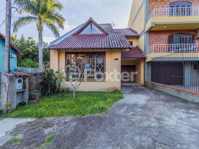 Casa em condomínio fechado com 3 quartos à venda na Avenida Vicente Monteggia, 1010, Cavalhada, Porto Alegre, 190 m2 por R$ 550.000