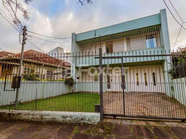 Casa comercial com 2 salas à venda na Rua Fagundes Varela, 83, Santo Antônio, Porto Alegre, 300 m2 por R$ 750.000