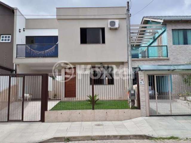 Casa com 3 quartos à venda na Rua Sol Nascente, 385, Lomba do Pinheiro, Porto Alegre, 147 m2 por R$ 440.000