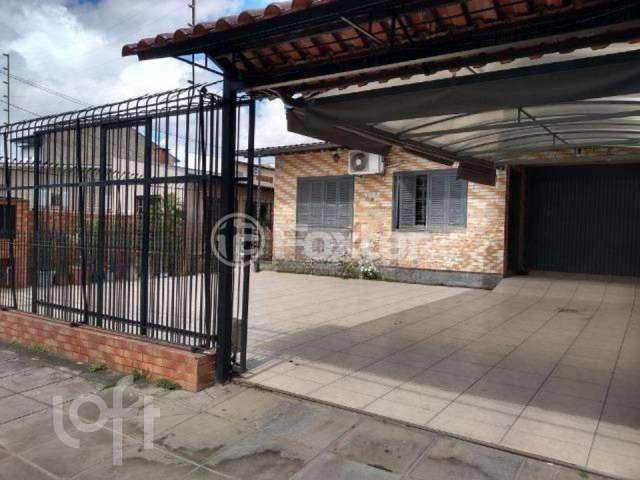 Casa com 4 quartos à venda na Avenida Vinte e Um de Abril, 1098, Sarandi, Porto Alegre, 160 m2 por R$ 430.000