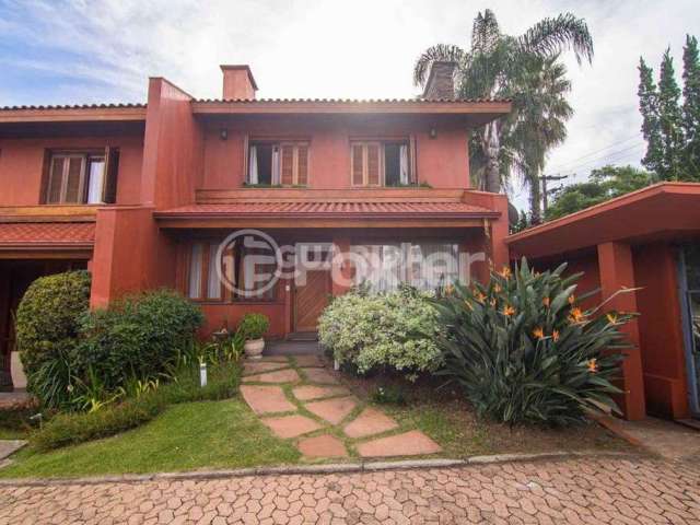 Casa em condomínio fechado com 3 quartos à venda na Avenida Cai, 735, Cristal, Porto Alegre, 290 m2 por R$ 1.700.000