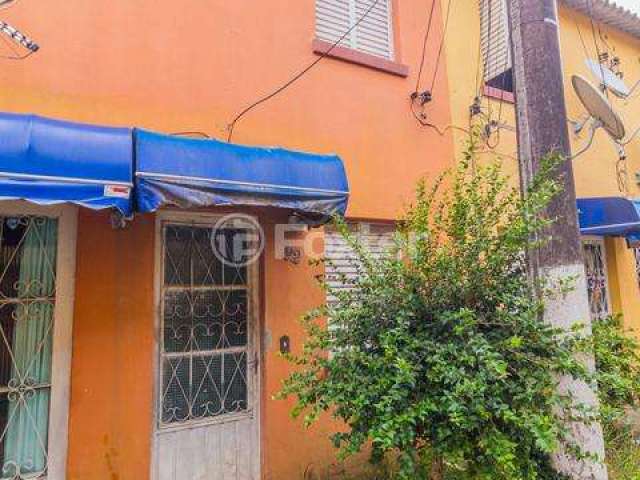 Casa em condomínio fechado com 2 quartos à venda na Rua Joaquim Cruz, 555, Santo Antônio, Porto Alegre, 74 m2 por R$ 135.000