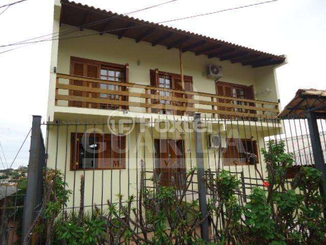 Casa com 3 quartos à venda na Avenida Natal, 241, Medianeira, Porto Alegre por R$ 585.000