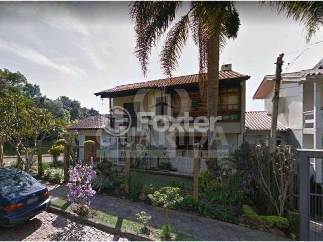 Casa com 3 quartos à venda na Rua Olécio Cavedini, 255, Espírito Santo, Porto Alegre, 159 m2 por R$ 980.000