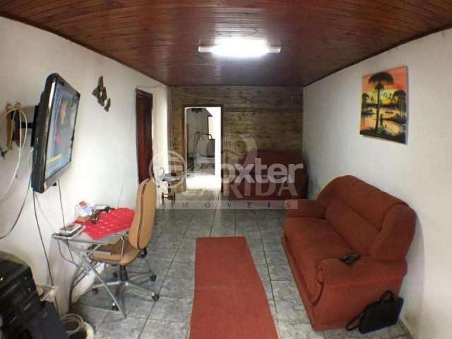 Casa com 2 quartos à venda na Rua Professor Rubens Guelli, 105, Vila Nova, Porto Alegre, 200 m2 por R$ 400.100