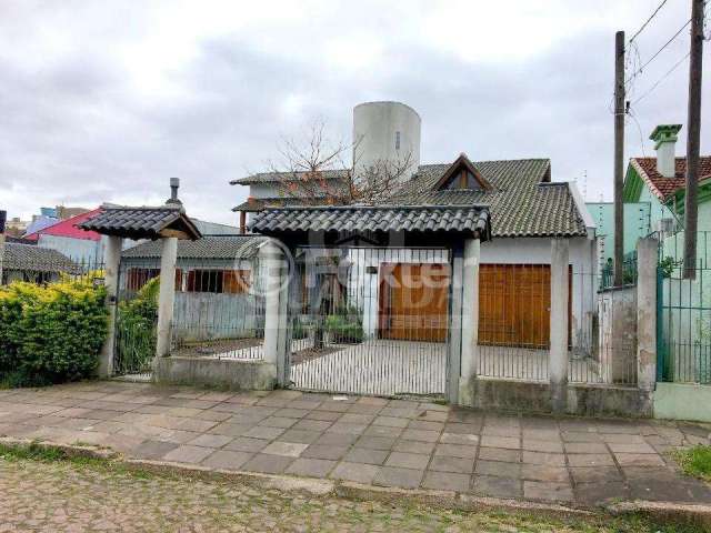 Casa com 4 quartos à venda na Rua Alfredo Silveira Dias, 36, Nonoai, Porto Alegre, 294 m2 por R$ 1.300.000