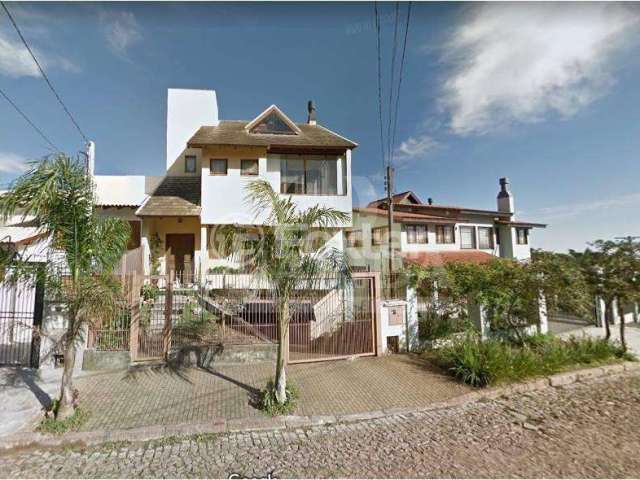 Casa com 3 quartos à venda na Rua Comendador José Júlio de Mello, 184, Teresópolis, Porto Alegre, 300 m2 por R$ 1.045.000