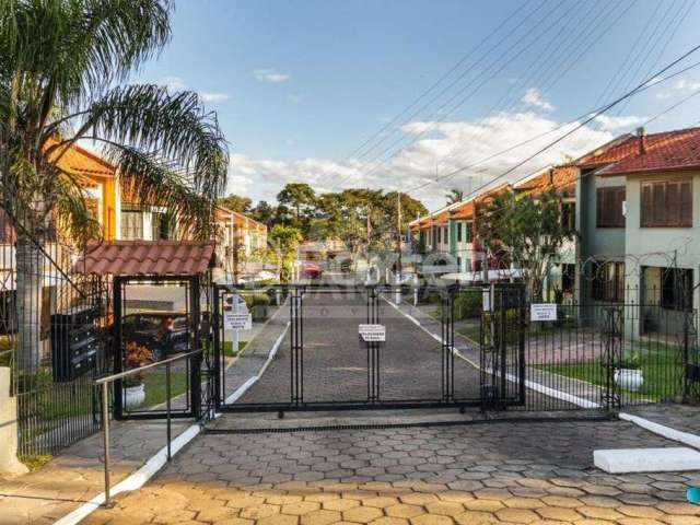 Casa em condomínio fechado com 3 quartos à venda na Avenida Juca Batista, 4075, Cavalhada, Porto Alegre, 99 m2 por R$ 390.000