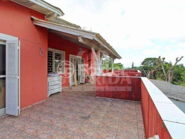 Casa com 4 quartos à venda na Avenida Cinco de Novembro, 346, Teresópolis, Porto Alegre, 180 m2 por R$ 490.000