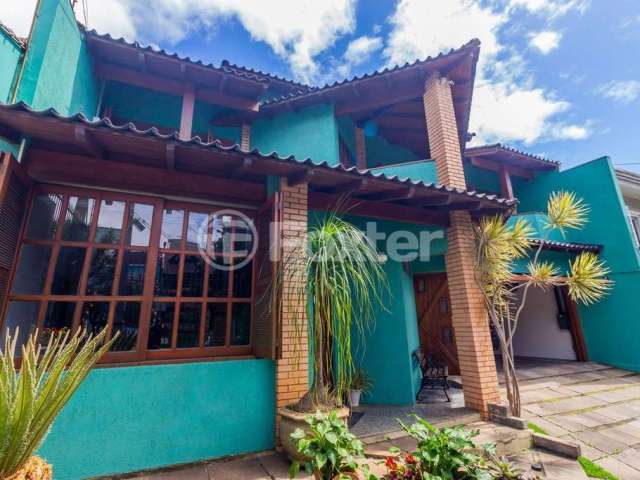 Casa comercial com 4 salas à venda na Rua Adda Mascarenhas de Moraes, 1481, Jardim Itu Sabará, Porto Alegre, 360 m2 por R$ 1.790.000