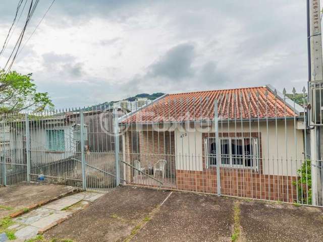 Casa com 3 quartos à venda na Rua Thomaz Francisco de Jesus, 472, Jardim Carvalho, Porto Alegre, 150 m2 por R$ 270.000