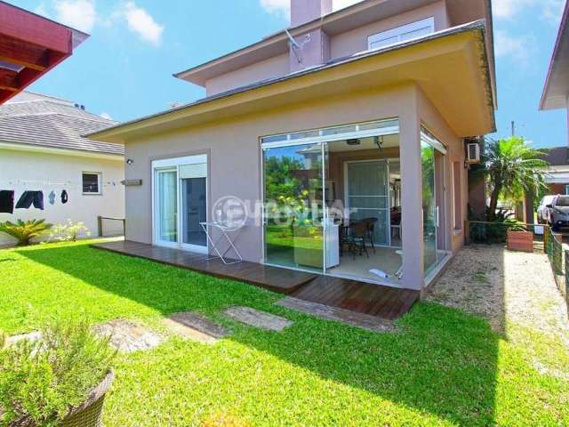 Casa em condomínio fechado com 4 quartos à venda na Avenida Paraguassú, S/N, Atlântida Sul (Distrito), Osório, 242 m2 por R$ 1.590.000