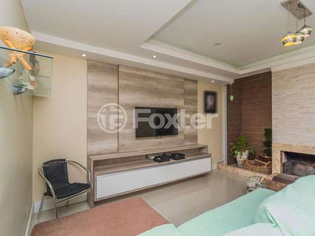 Casa com 3 quartos à venda na Rua Danton Krás Borges, 53, Guarujá, Porto Alegre, 165 m2 por R$ 565.000