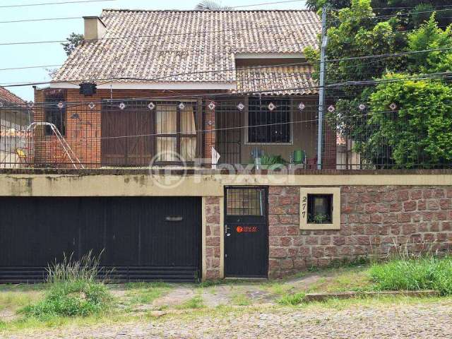 Casa com 3 quartos à venda na Avenida Deputado Aramy Silva, 277, Santa Tereza, Porto Alegre, 154 m2 por R$ 945.000