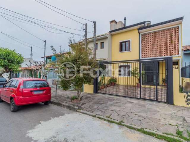 Casa com 3 quartos à venda na Rua Eva Pinto, 114, Hípica, Porto Alegre, 91 m2 por R$ 550.000