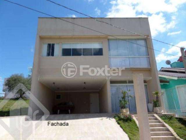 Casa em condomínio fechado com 4 quartos à venda na Rua Arahy Borges Ortiz, 30, Mário Quintana, Porto Alegre, 204 m2 por R$ 750.000