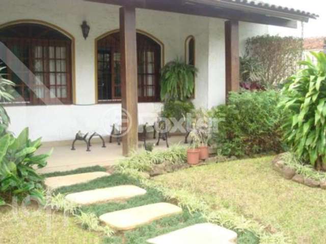 Casa com 4 quartos à venda na Rua Olécio Cavedini, 185, Espírito Santo, Porto Alegre, 263 m2 por R$ 850.000