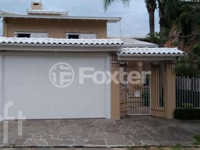 Casa com 4 quartos à venda na Rua Osvaldo Benevides Dantas, 49, Morro do Espelho, São Leopoldo, 292 m2 por R$ 950.000