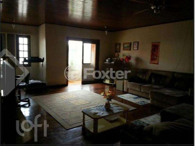 Casa com 4 quartos à venda na Rua Adroaldo Novo Correa, 126, Cavalhada, Porto Alegre, 270 m2 por R$ 900.000