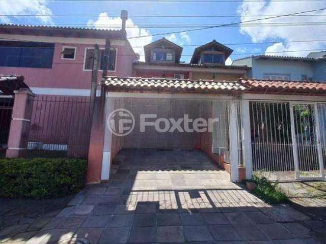 Casa com 3 quartos à venda na Rua James Bocacio, 116, Hípica, Porto Alegre, 123 m2 por R$ 450.000