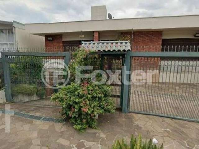 Casa com 4 quartos à venda na Rua Carlos Huber, 826, Três Figueiras, Porto Alegre, 318 m2 por R$ 1.852.500