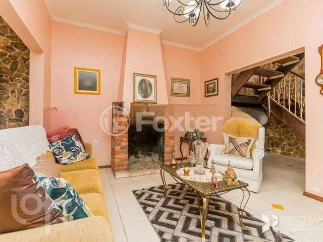 Casa com 3 quartos à venda na Avenida Capivari, 391, Cristal, Porto Alegre, 300 m2 por R$ 1.590.000