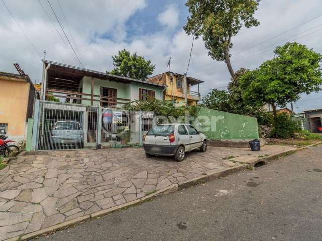 Casa com 6 quartos à venda na Avenida Paulo Pontes, 648, Cavalhada, Porto Alegre, 247 m2 por R$ 550.905