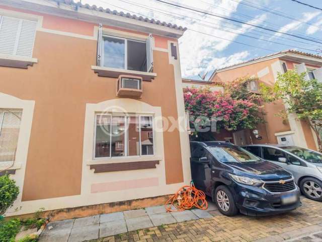 Casa em condomínio fechado com 3 quartos à venda na Rua Tenente Ary Tarrago, 1720, Jardim Itu Sabará, Porto Alegre, 84 m2 por R$ 370.000