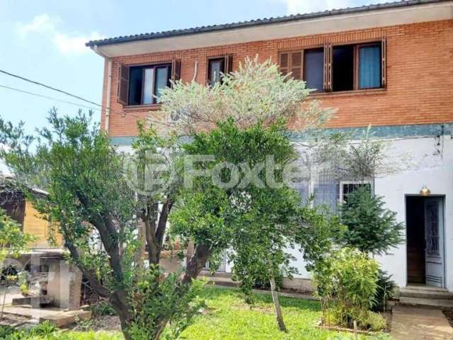 Casa com 3 quartos à venda na Rua Vinte e Cinco de Julho, 55, Santa Maria Goretti, Porto Alegre, 292 m2 por R$ 800.000