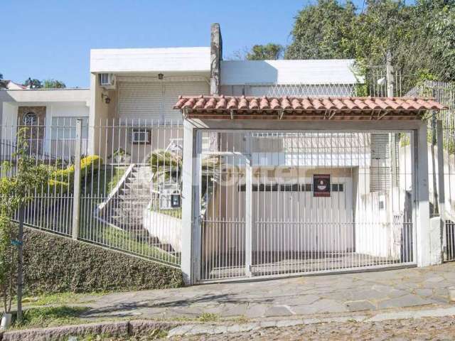 Casa com 3 quartos à venda na Rua Landel de Moura, 1435, Tristeza, Porto Alegre, 180 m2 por R$ 1.390.000